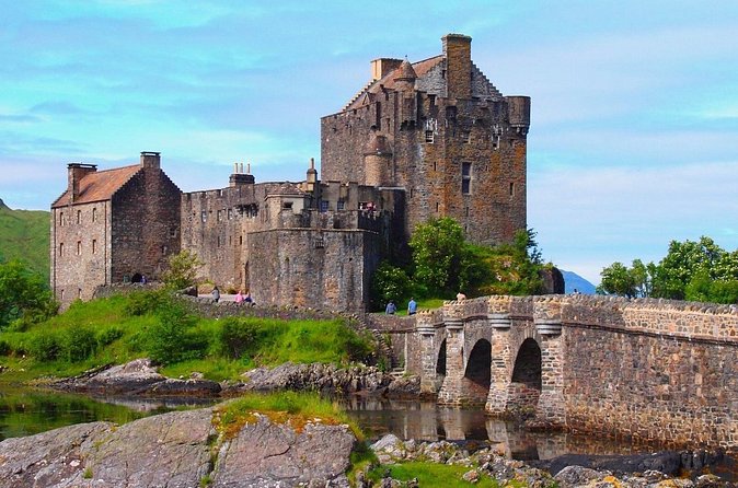 1 Day Tour from Inverness - Isle of Skye, Fairy Pools, and Eilean Donan Castle - Eilean Donan Castle at the meeting of three lochs