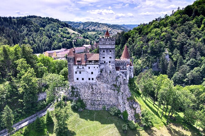 3-Castle: Peles,Bran,Rasnov,Sinaia Monastery from Brasov w pickup - Bran Castle: medieval walls and Dracula marketing