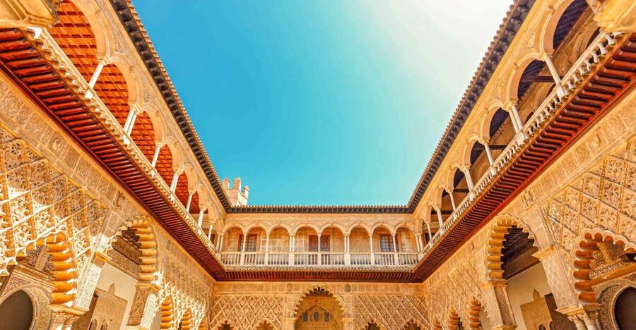 Alcázar of Seville Skip-the-Line Tickets and Guided Tour - Moorish rooms, tiled surfaces, and royal spaces