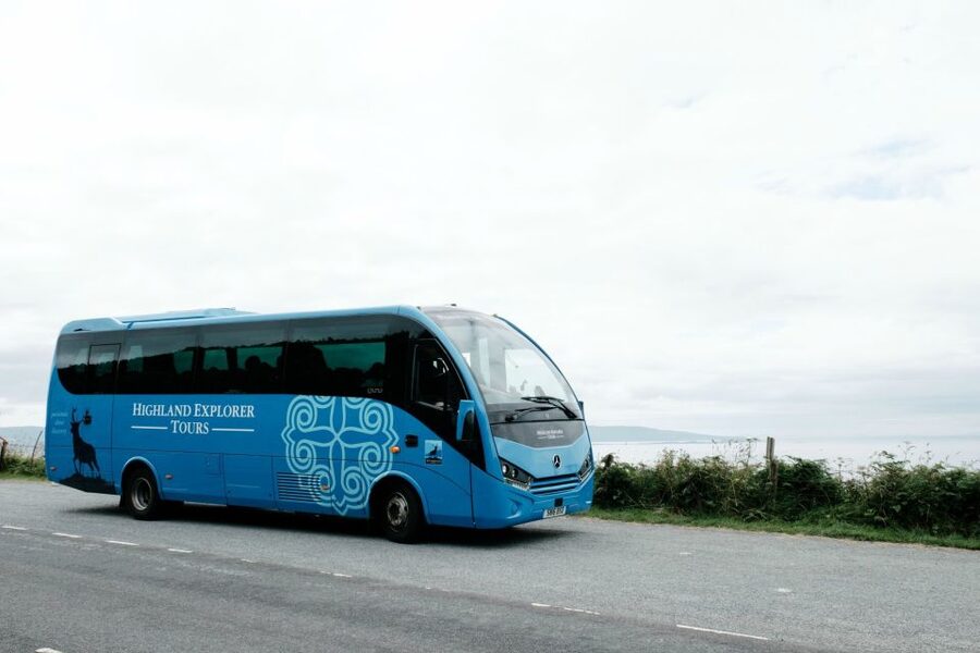 Alnwick Castle and Scottish Borders Tour from Edinburgh - Bamburgh: beach, volcanic rock, and a medieval stronghold