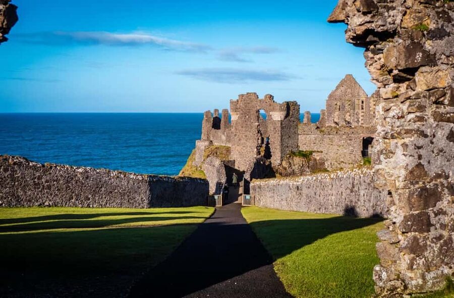 Belfast: Giant's Causeway & Irish Castles Tour -WIFI onboard - The Antrim Coast arrives through the coach window