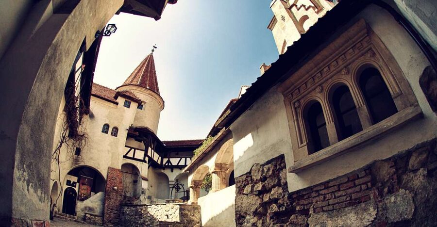 Bucharest: Dracula Castle, Peles Castle & Brasov Guided Tour - Bran Castle and the Dracula question