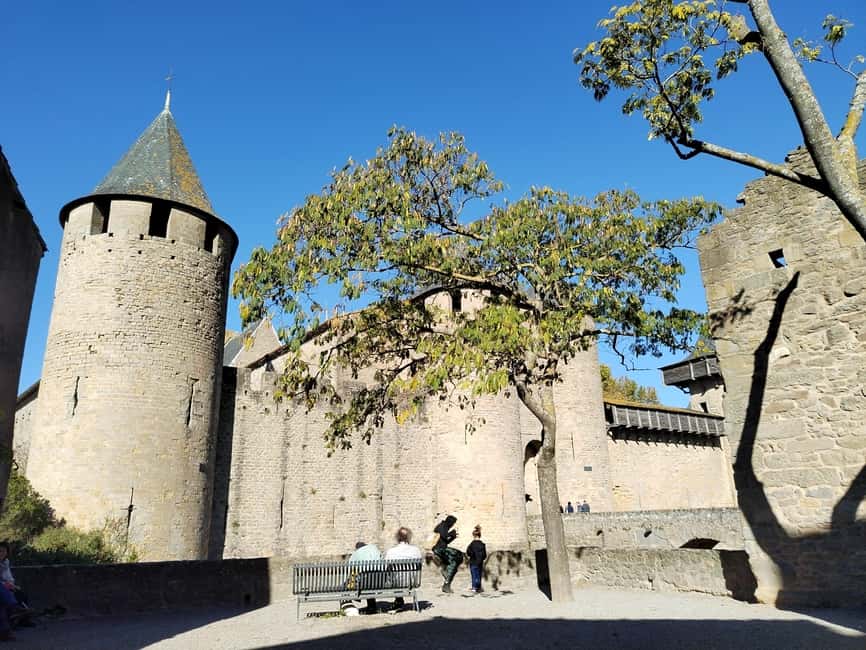 Carcassonne: Private Guided Tour of the Medieval Fortress - The Château Comtal and ramparts during the three-hour tour