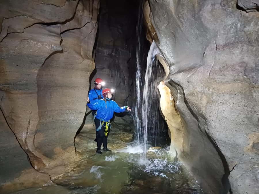 Christchurch: Caving & Optional Castle Hill Tour - Getting there by van, bakery stop, and country road