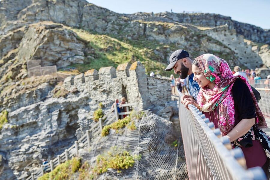 Cornwall: Tintagel Castle Entry Ticket - Crossing the footbridge above the Atlantic