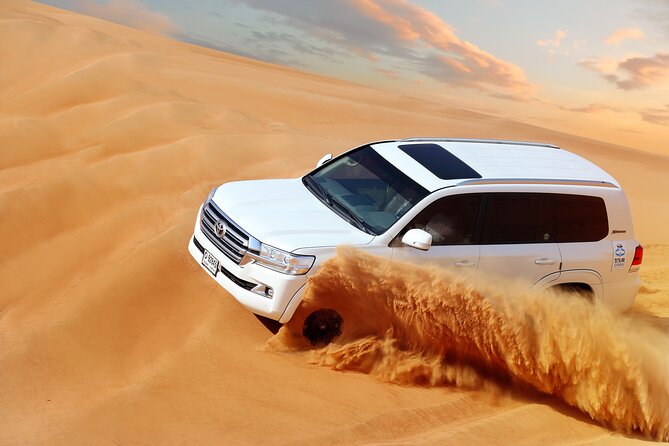 Desert Safari: Luxury Fortress Dinner, Camel Ride & Dune Bashing - Al Sahra Desert Fortress turns dinner into a show