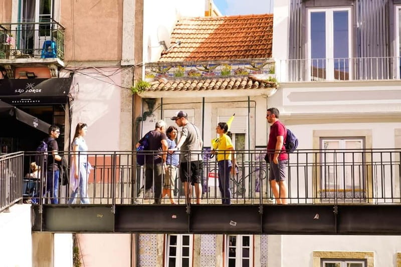 Discover Alfama with the Exterior View of São Jorge Castle - Azulejos, old churches, and everyday Lisbon