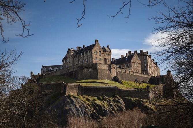 Edinburgh Castle & Royal Mile Walking Tour - Ticket Included - Climbing toward the Castle Esplanade
