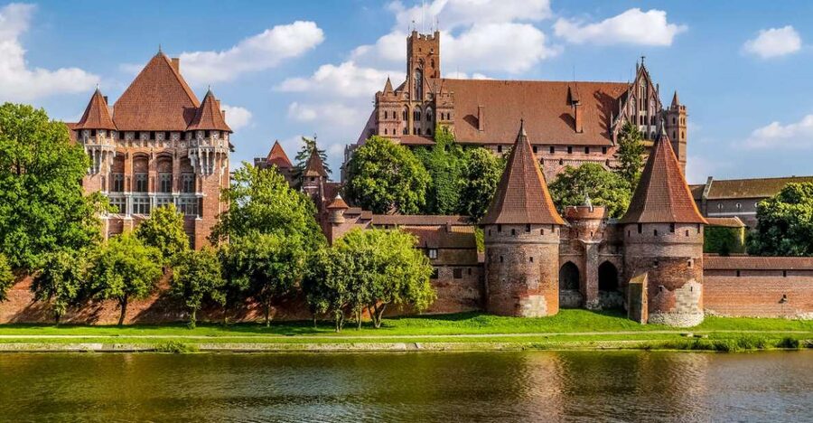 From Gdansk: Half-Day Malbork Castle Tour with Audioguide - First View of Malbork’s Brick Fortress