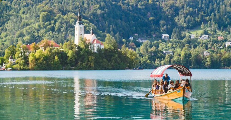 From Ljubljana: Lake Bled and Bled Castle Tour - Arriving below the Julian Alps