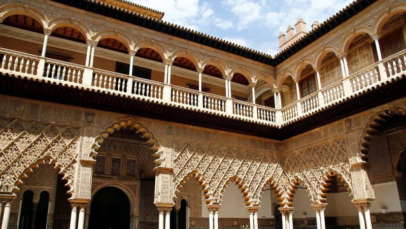 From Malaga: Seville Day Trip with Real Alcázar Tickets - Walking through Santa Cruz