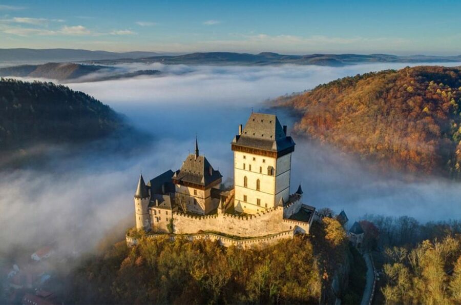 From Prague: Karlštejn Castle & Koněprusy Caves Tour - Leaving Prague in a seven-person minivan