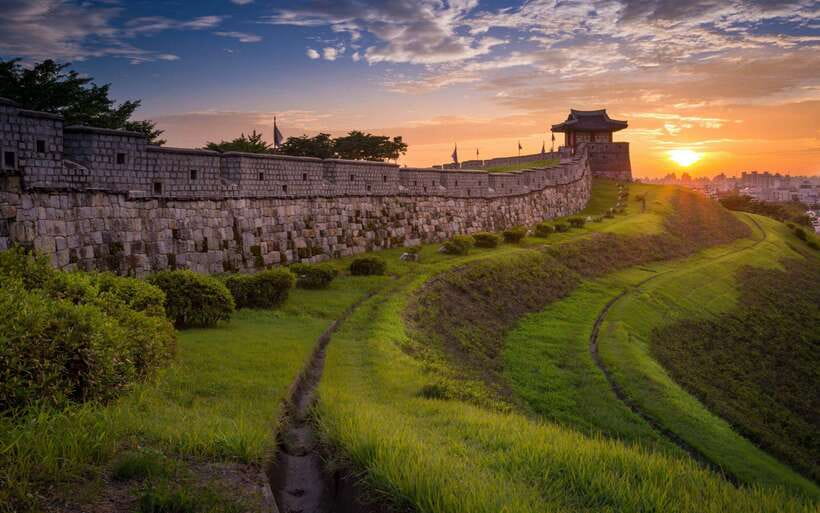 From Seoul: Suwon Hwaseong Fortress Night Tour - Walking the illuminated fortress walls