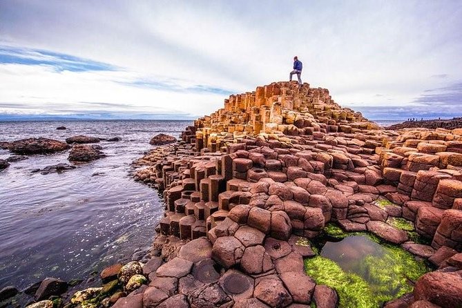 Giant's Causeway Tour from Belfast - Luxury Bus + Castles Tour - Dunluce Castle brings drama at day’s end