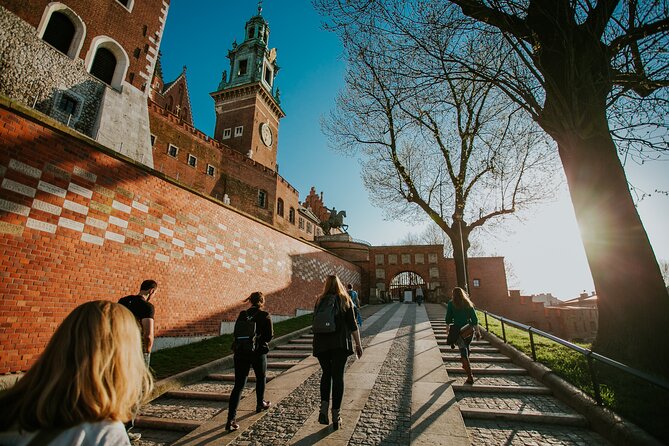Historic Krakow : Old Town & Wawel Castle Walking tour - Walking uphill toward Wawel Castle