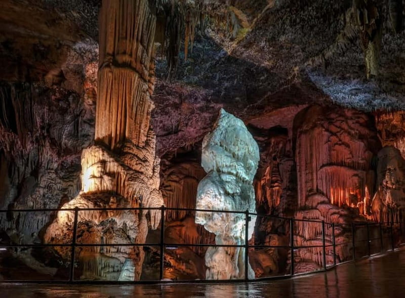 Koper/Trieste: Postojna Cave & Predjama Castle Tour & Ticket - Inside Postojna Cave, where the train sets the pace