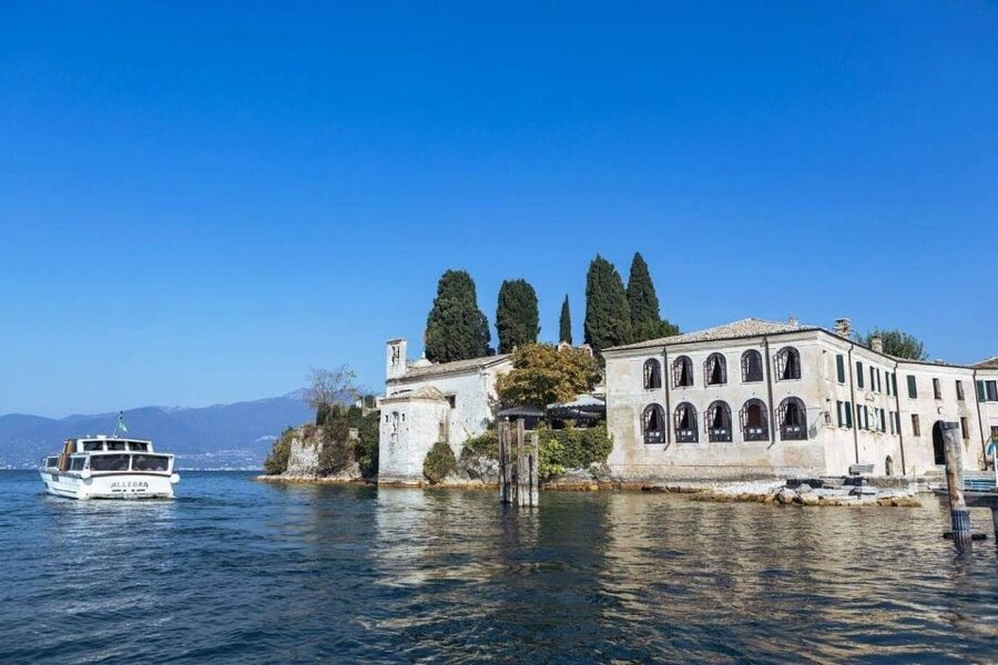 Lake Garda: Historic Castle Cruise with Wine Tasting - The swimming stop near Villa Canossa