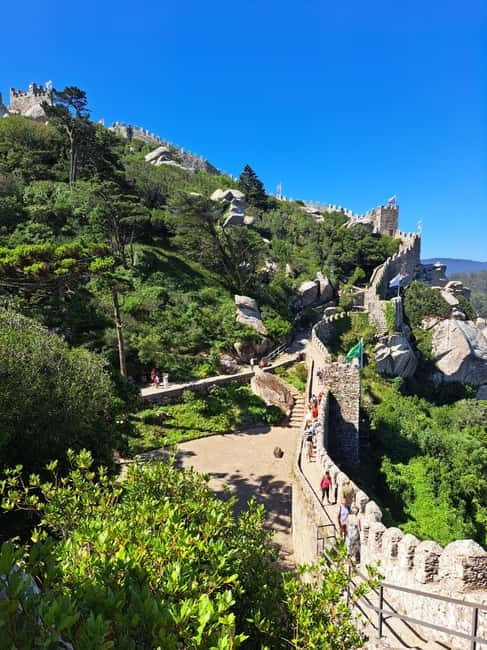 Lisbon: Sintra, Pena Palace, Moorish Castle & Regaleira Tour - Sintra Old Town, snacks, and a proper pause