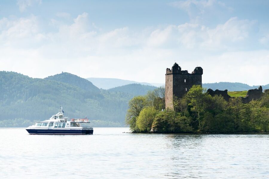 Loch Ness: Urquhart Castle Round-Trip Cruise - Listening to the stories of Loch Ness