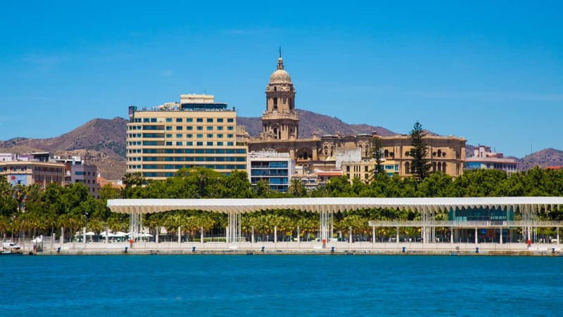 Malaga: Castle Hill and Fisherman Village E-Bike Tour - Climbing toward Gibralfaro and the Parador