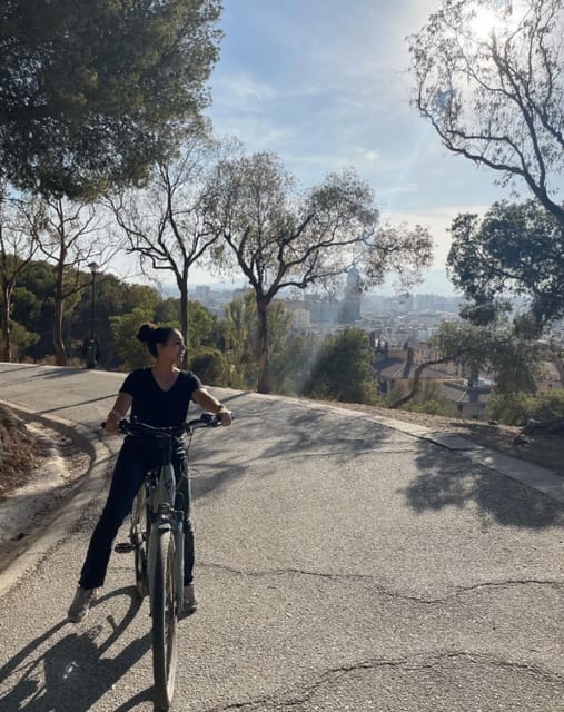 Malaga: Castle Hill and Fisherman Village E-Bike Tour - Cycling the promenade toward Miramar Palace