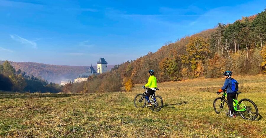 Mountain Biking Full Day Trip to The Karlstejn Castle - Forest trails, open meadows, and village roads