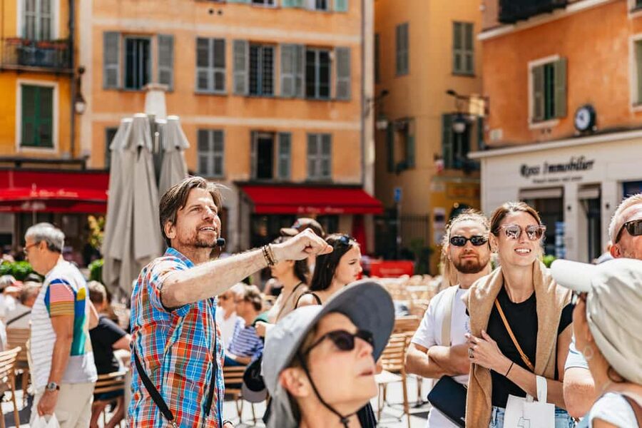 Nice: Old Town & Castle Hill Informative Guided Walking Tour - Place Massena and the red facades