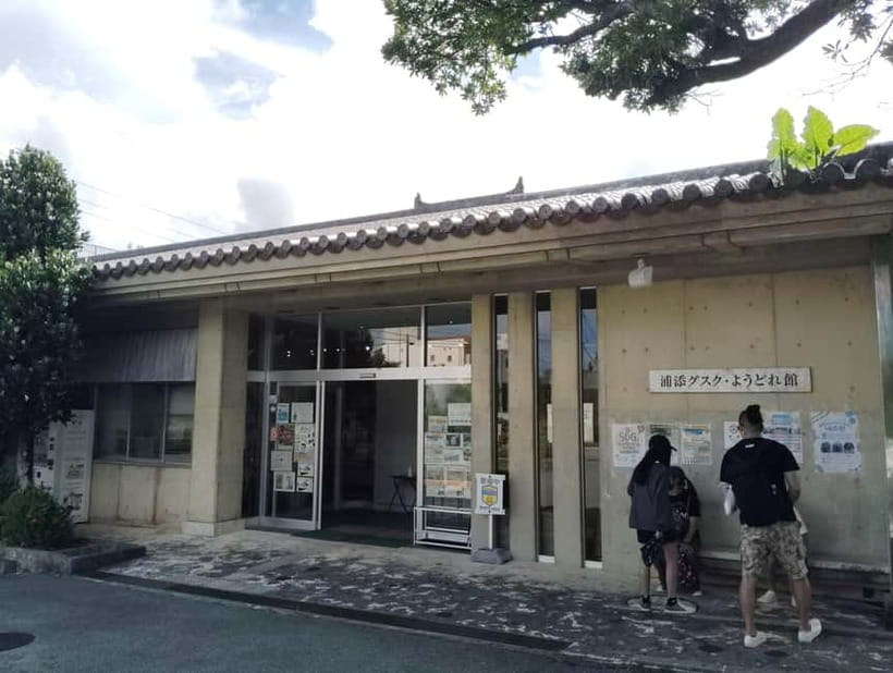 Okinawa: Urasoe Castle, Royal Tomb & War History Walk - Climbing toward Urasoe Castle’s ruined walls