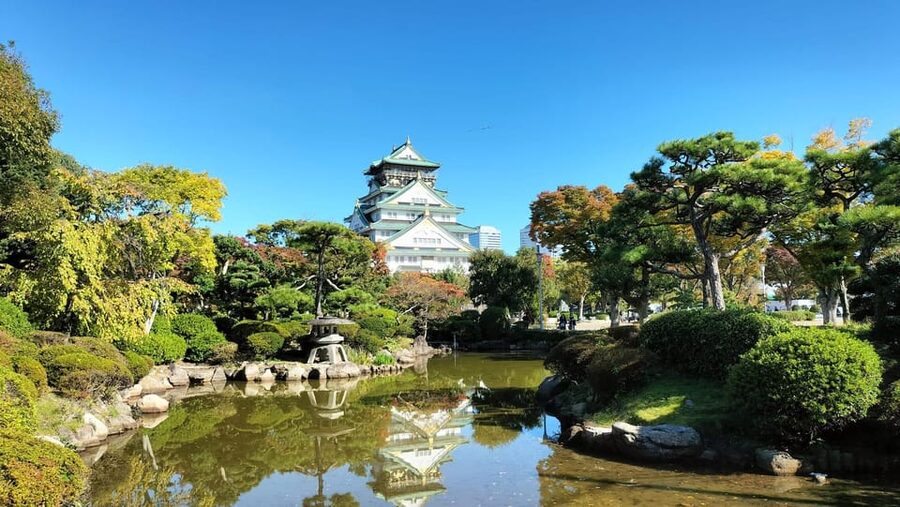 Osaka Castle Guided Tour - Crossing Osaka Castle Park