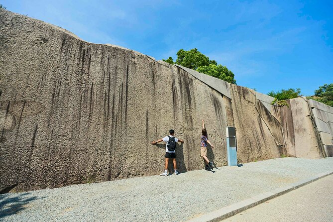 Osaka Castle Walking Tour and Castle Tower Admission - Crossing the Walls and Moats