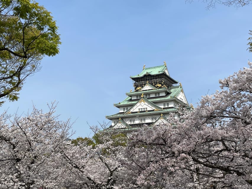 Osaka: Osaka Castle & Historical Museum Guided Tour - Walking Toward Osaka Castle