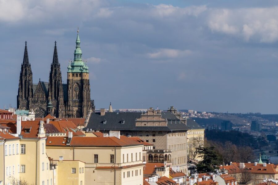 Prague: Castle Grounds & Highlights Walking Tour small-group - The Old Royal Palace and its warm-colored walls
