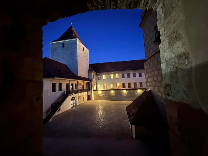 Prague: Night Walk through Prague Castle with City Views - The included tram ride to the castle