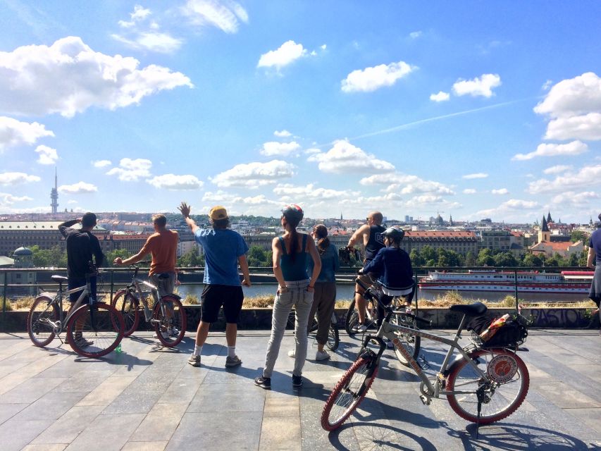 Prague: Stunning Viewpoints, Castle, City & Park E-Bike Tour - Riding toward Prague Castle