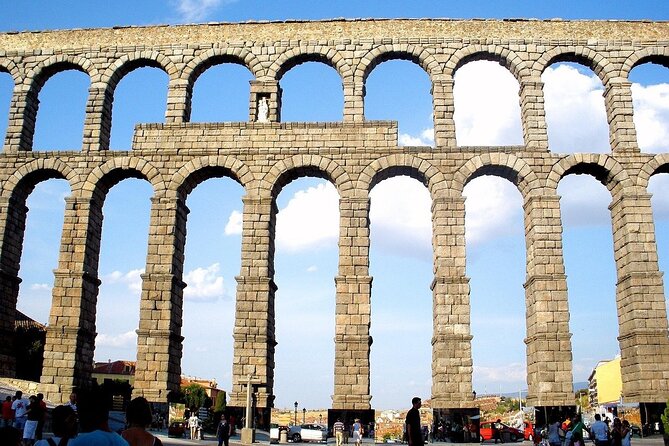 Segovia - Old Town tour including Castle visit - Starting beneath Segovia’s Roman aqueduct