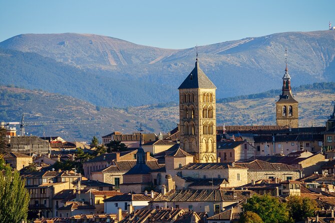 Segovia - Old Town tour including Castle visit - Reading the Gothic Cathedral in Plaza Mayor