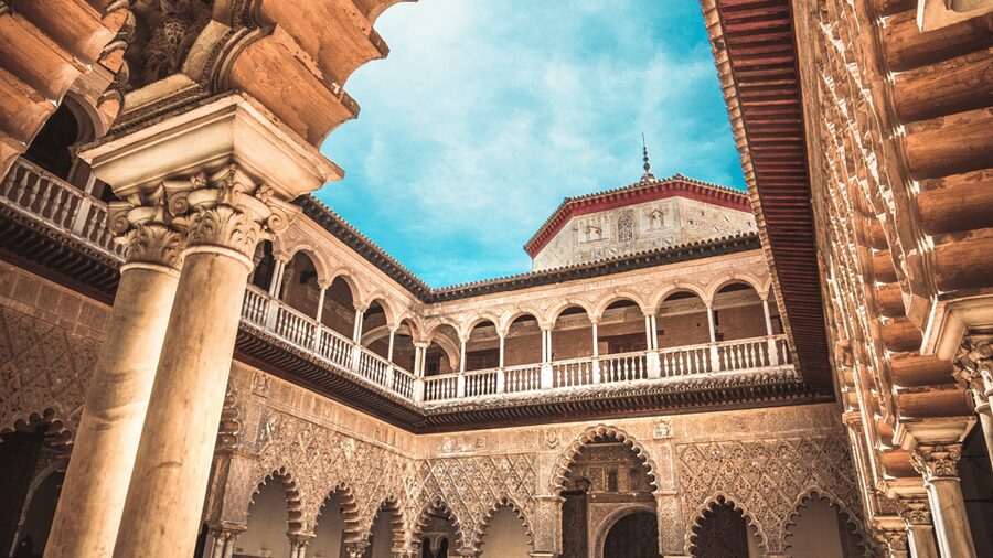 Seville: Alcazar, Cathedral, and Giralda Skip-the-Line Tour - The Alcazar: royal rooms, courtyards, and screen fame