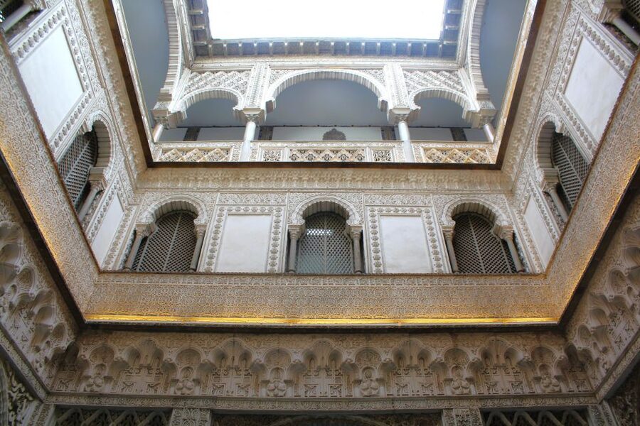 Seville: Royal Alcazar, Cathedral, and Giralda Tower Tour - Puerta del Perdón, Patio de los Naranjos, and the plazas