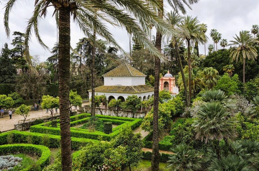 Seville: Small-Group Alcázar Guided Tour & Entry Ticket - Entering through the palace complex