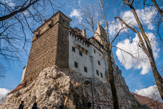 Small-Group Day Trip to Dracula's Castle, Brasov and Peles Castle - Bran Castle: Dracula, history, and managed expectations